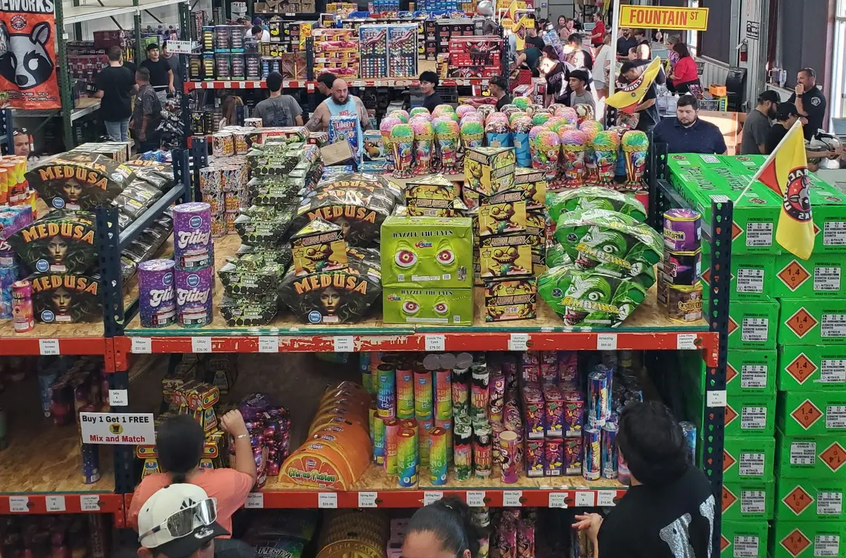 Shoppers in the aisles at Dynamite Fireworks Superstore on the 4th of July