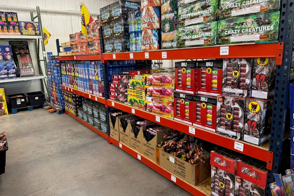A shelf of Black Cat fireworks