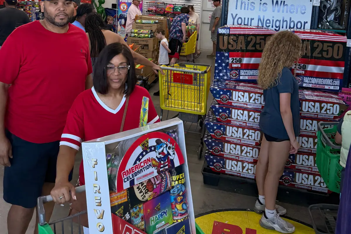 Shoppers at the USA 250 display on the 4th of July