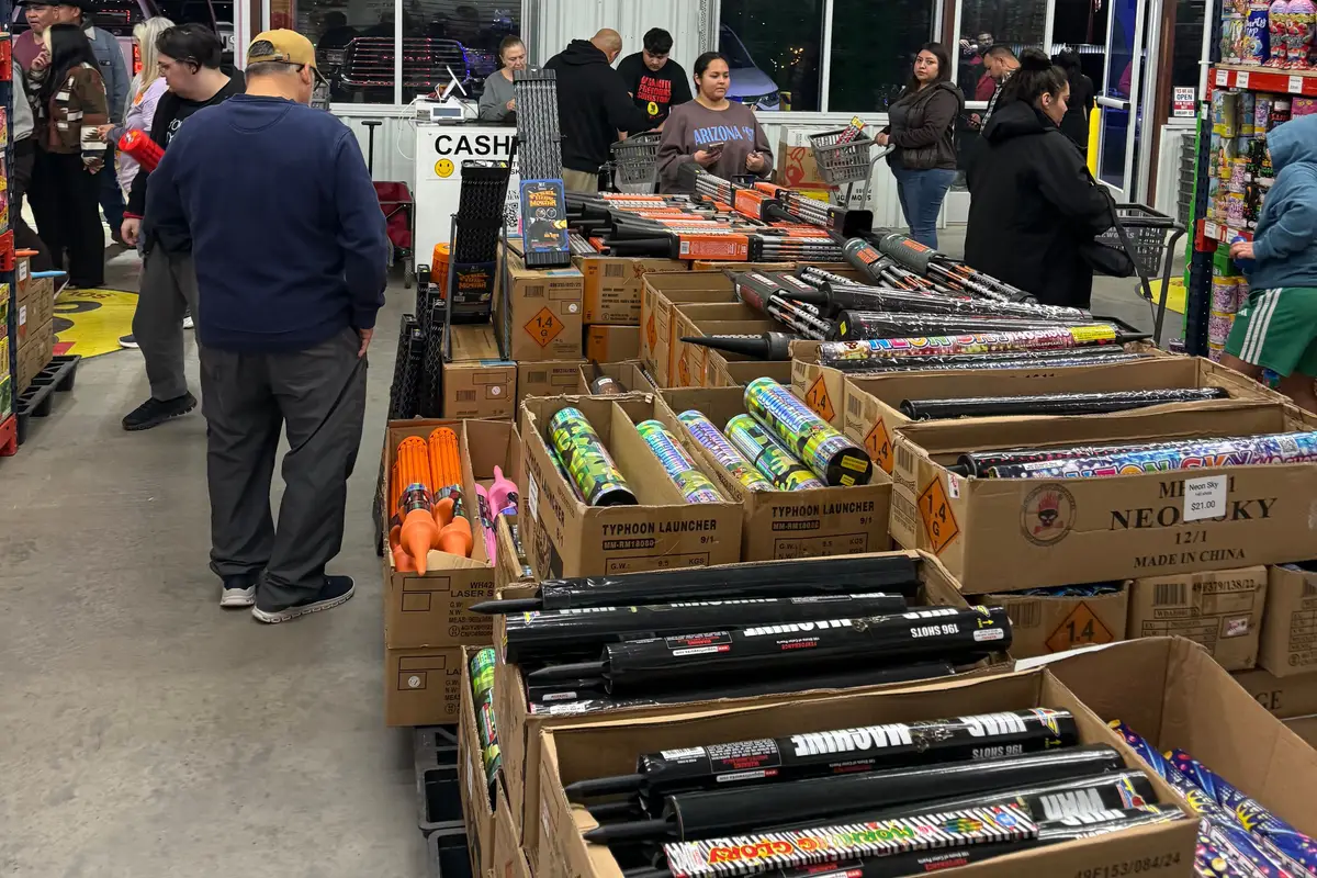 Bulk boxes of mortars and shells by the registers on New Year's Eve