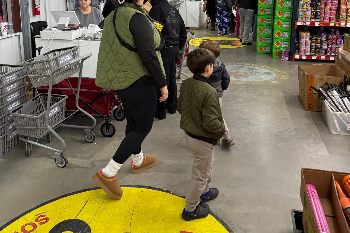 The Black Cat logo on the floor at the store entrance